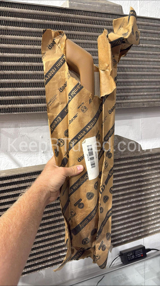 NOS Tan Armrest Drivers Side